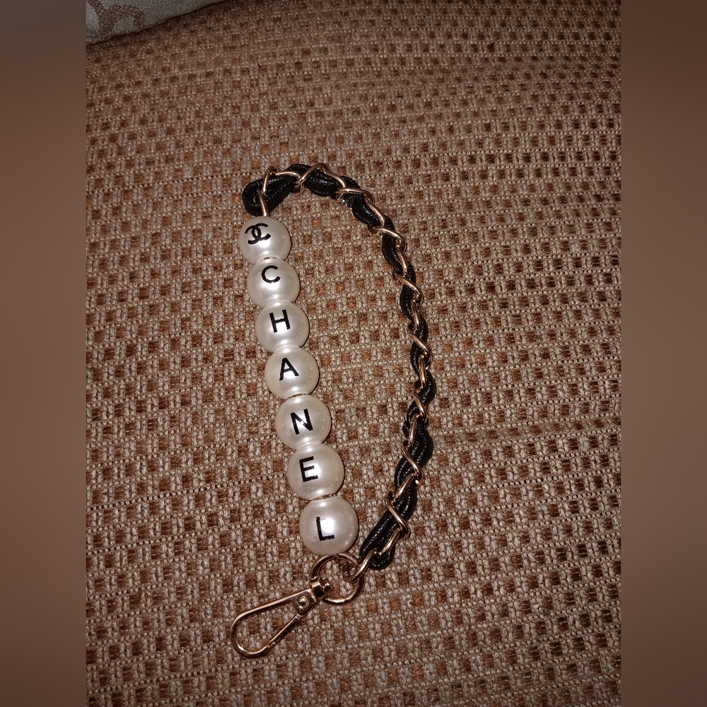 Chanel rare pearl CC logo bag strap